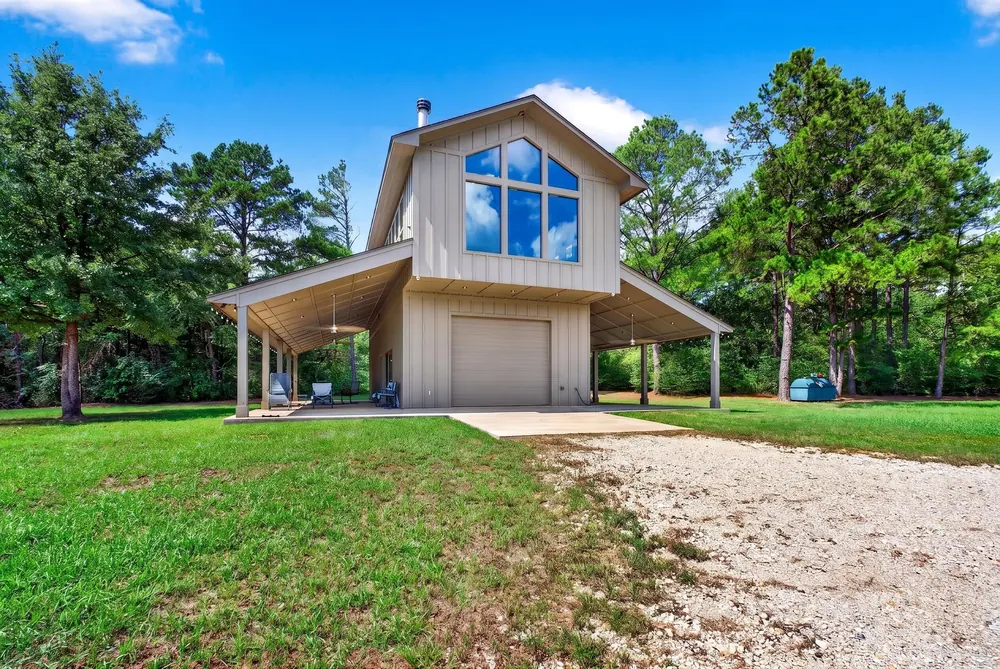 Front exterior of the barndominium-style residence