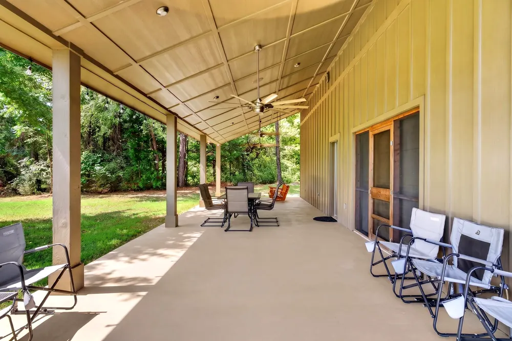 Covered patio overlooking the property