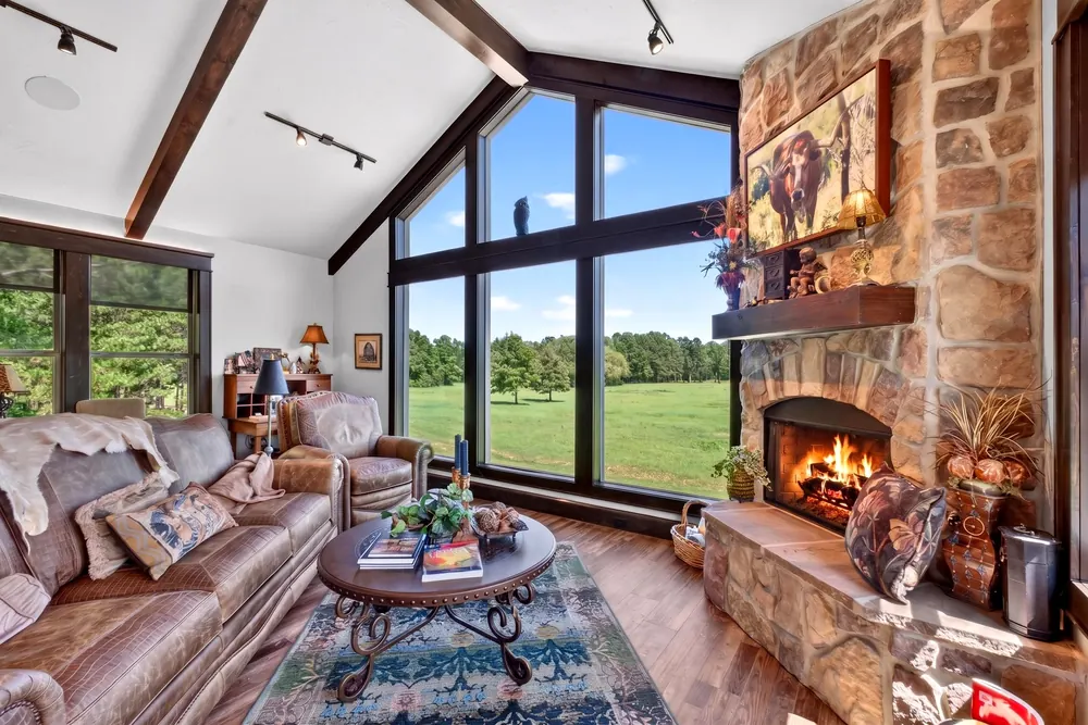 Stone fireplace and pasture views in the great room